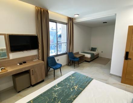 غرفة ثلاثية